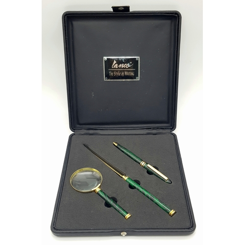 541 - A Lanco Vintage Stationary Set. Ballpoint pen. letter opener and magnifying glass. Malachite and gil... 