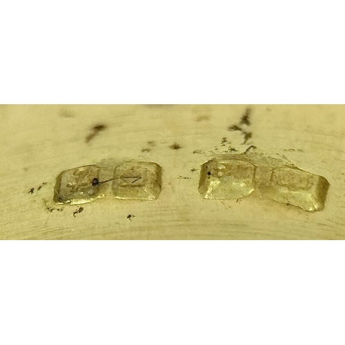 37 - An 18K Yellow Gold Emerald and Diamond Band Ring. c. 0.50ctw of round cut emeralds and c. 0.50ctw of... 