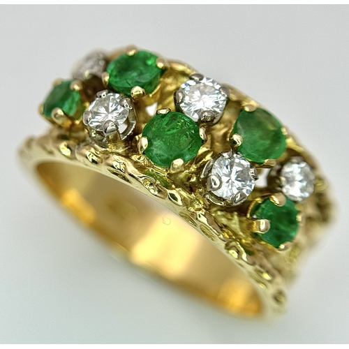 37 - An 18K Yellow Gold Emerald and Diamond Band Ring. c. 0.50ctw of round cut emeralds and c. 0.50ctw of... 