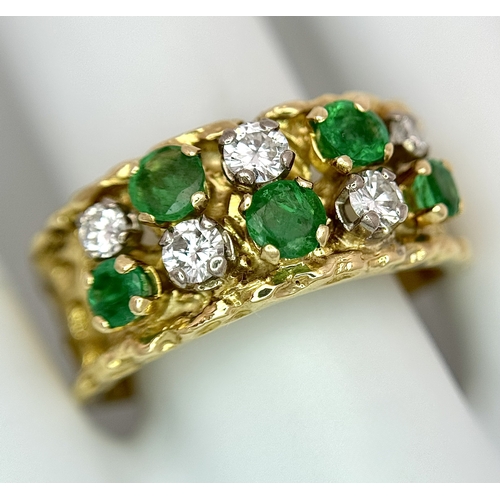 37 - An 18K Yellow Gold Emerald and Diamond Band Ring. c. 0.50ctw of round cut emeralds and c. 0.50ctw of... 