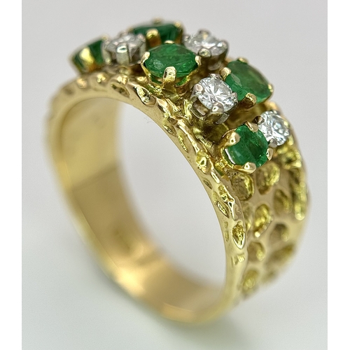 37 - An 18K Yellow Gold Emerald and Diamond Band Ring. c. 0.50ctw of round cut emeralds and c. 0.50ctw of... 