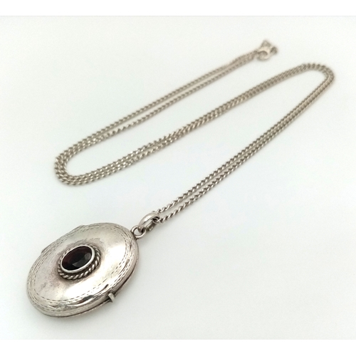 1181 - A vintage 925 silver stone set Oval locket pendant, set on a silver necklace. Total length 58cm, tot... 
