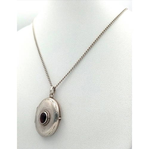 1181 - A vintage 925 silver stone set Oval locket pendant, set on a silver necklace. Total length 58cm, tot... 