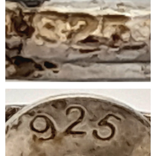 1216 - 2X gorgeous pairs of silver earrings with different designs. Total weight 2G. Please see photos for ... 