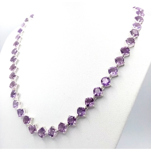 565 - An Amethyst Gemstone Tennis Necklace. Set in 925 Silver. 44cm length. CD-2059.