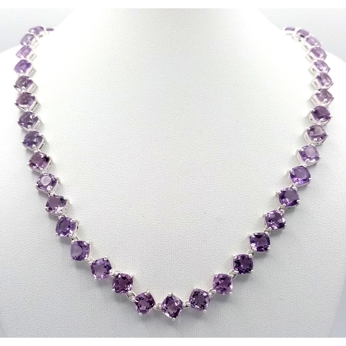565 - An Amethyst Gemstone Tennis Necklace. Set in 925 Silver. 44cm length. CD-2059.
