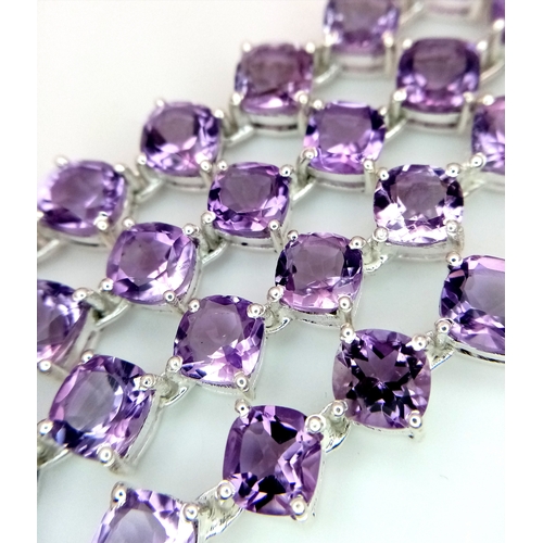 565 - An Amethyst Gemstone Tennis Necklace. Set in 925 Silver. 44cm length. CD-2059.