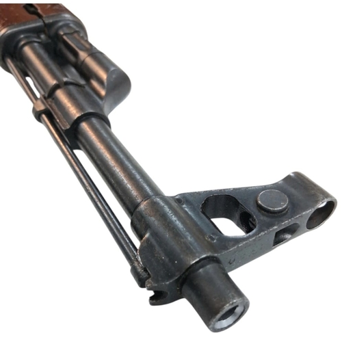 839 - A Deactivated Vintage Chinese Model 56 Assault Rifle. 7.62 x 39 calibre. Bakelite furniture. Folding... 