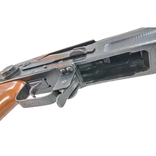 839 - A Deactivated Vintage Chinese Model 56 Assault Rifle. 7.62 x 39 calibre. Bakelite furniture. Folding... 