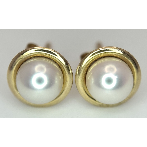 1294 - A Pair of 9 Carat Yellow Gold Cultured Pearl Stud Earrings. Set with 6mm Pearls. Come in presentatio... 