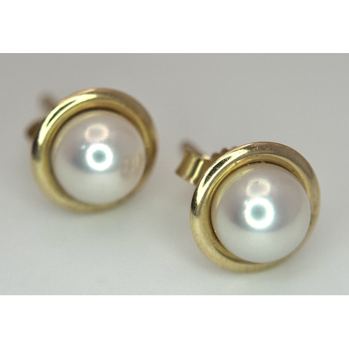 1294 - A Pair of 9 Carat Yellow Gold Cultured Pearl Stud Earrings. Set with 6mm Pearls. Come in presentatio... 