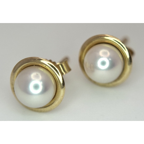 1294 - A Pair of 9 Carat Yellow Gold Cultured Pearl Stud Earrings. Set with 6mm Pearls. Come in presentatio... 