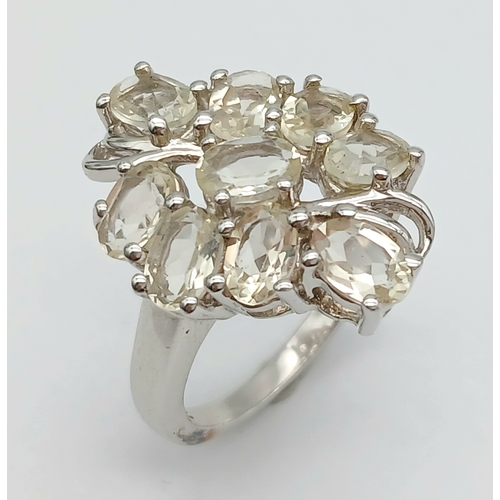 1469 - An Impressive Sterling Silver Lemon Quartz Cluster Ring Size P. The Ring measures 2.3cm Long at the ... 