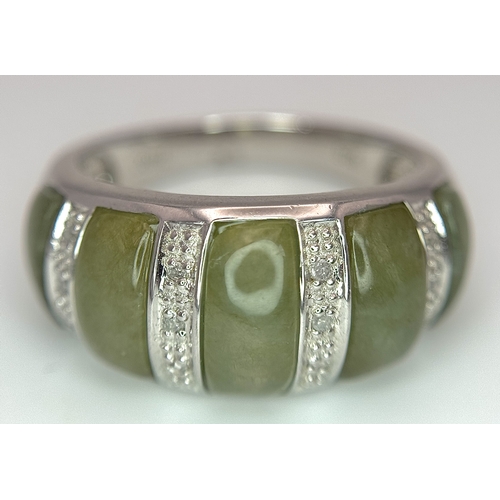1273 - An Attractive Sterling Silver Jade and Diamond Ring Size P. The Ring is set with five graduating siz... 