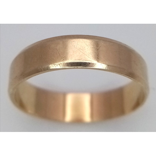 1379 - A 9K GOLD BAND RING .       1.8gms    size L