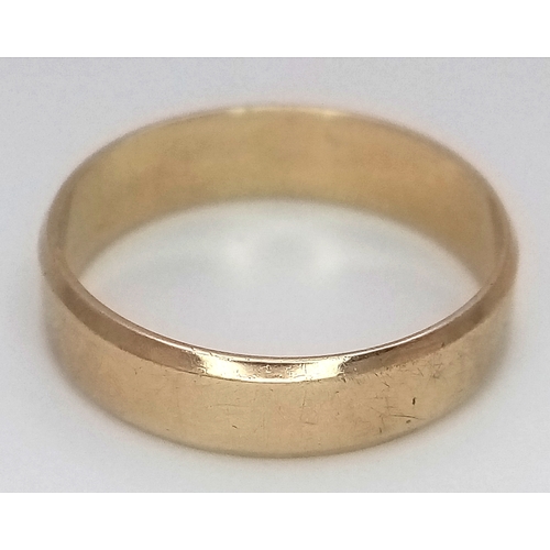 1379 - A 9K GOLD BAND RING .       1.8gms    size L