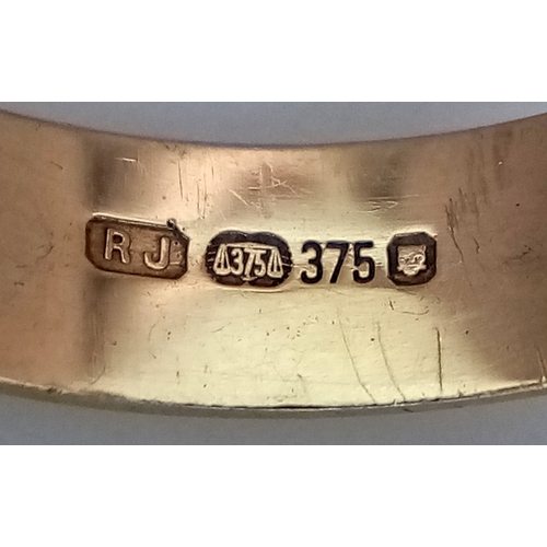 1379 - A 9K GOLD BAND RING .       1.8gms    size L