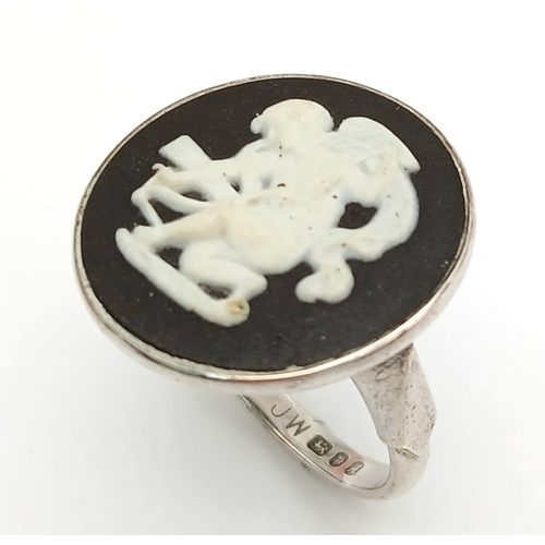 1619 - A Vintage Sterling Silver Wedgwood Black Cameo Ring Size M. The Ring measures 2cm Diameter at the Cr... 