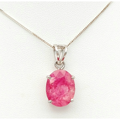 1437 - A Certificated Sterling Silver and 11 Carat Ruby Pendant Necklace-46cm Length Chain. The Pendant is ... 
