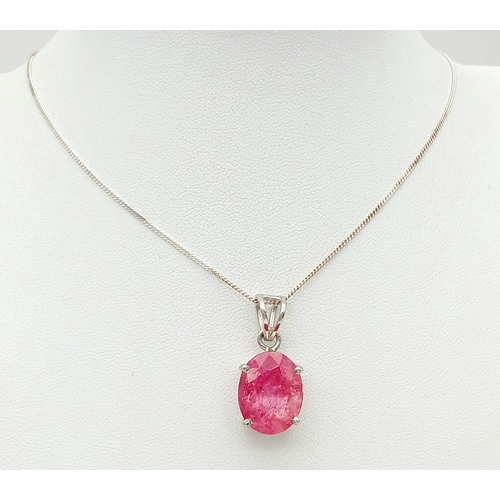 1437 - A Certificated Sterling Silver and 11 Carat Ruby Pendant Necklace-46cm Length Chain. The Pendant is ... 