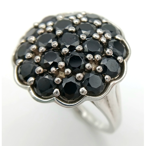 1697 - An Impressive Sterling Silver Black Spinel Cluster Ring Size R1/2. The Ring has a total of 6 Carats ... 