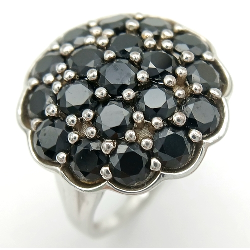 1697 - An Impressive Sterling Silver Black Spinel Cluster Ring Size R1/2. The Ring has a total of 6 Carats ... 