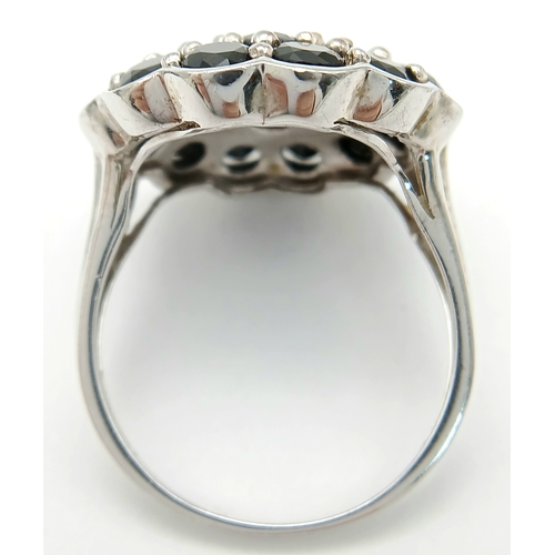 1697 - An Impressive Sterling Silver Black Spinel Cluster Ring Size R1/2. The Ring has a total of 6 Carats ... 