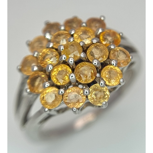 1764 - An Eye-Catching Sterling Silver Citrine Cluster Ring Size P1/2. The Ring measures 1.6cm Wide at the ... 
