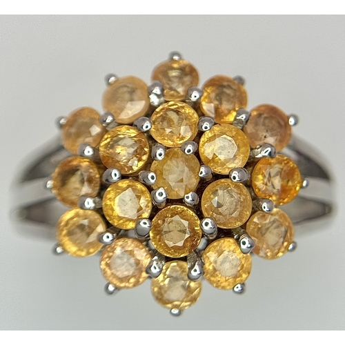 1764 - An Eye-Catching Sterling Silver Citrine Cluster Ring Size P1/2. The Ring measures 1.6cm Wide at the ... 