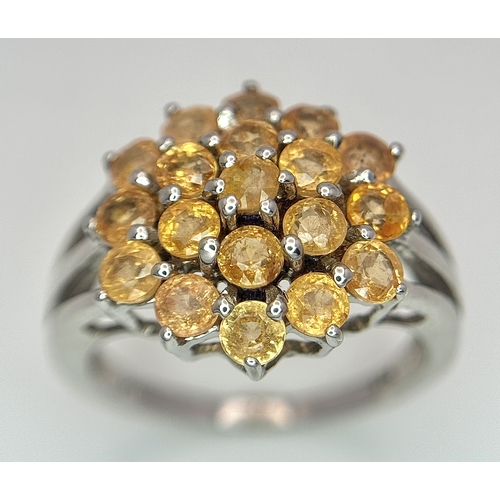 1764 - An Eye-Catching Sterling Silver Citrine Cluster Ring Size P1/2. The Ring measures 1.6cm Wide at the ... 