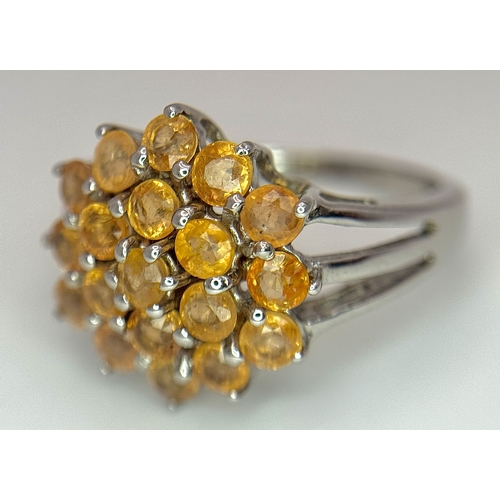1764 - An Eye-Catching Sterling Silver Citrine Cluster Ring Size P1/2. The Ring measures 1.6cm Wide at the ... 