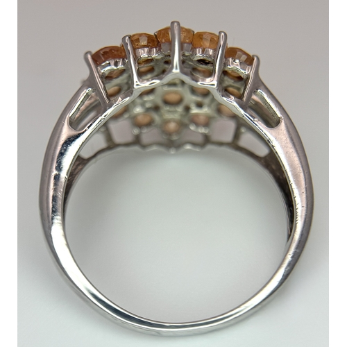 1764 - An Eye-Catching Sterling Silver Citrine Cluster Ring Size P1/2. The Ring measures 1.6cm Wide at the ... 