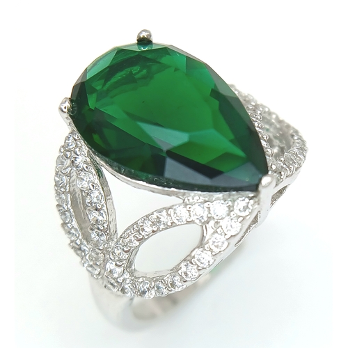 1169 - A STERLING SILVER GREEN STONE SET PEAR SHAPED RING 4.5G SIZE L. Ref: A/S NN 7003