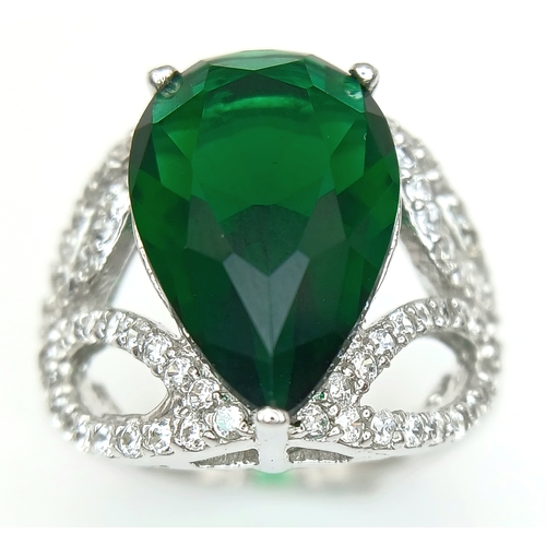1169 - A STERLING SILVER GREEN STONE SET PEAR SHAPED RING 4.5G SIZE L. Ref: A/S NN 7003