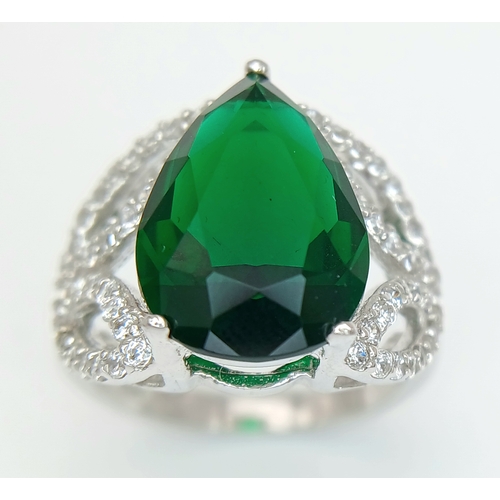 1169 - A STERLING SILVER GREEN STONE SET PEAR SHAPED RING 4.5G SIZE L. Ref: A/S NN 7003