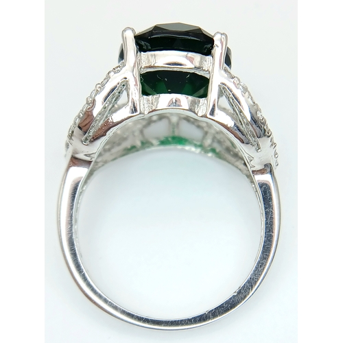 1169 - A STERLING SILVER GREEN STONE SET PEAR SHAPED RING 4.5G SIZE L. Ref: A/S NN 7003