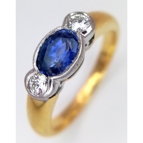 15 - An 18K YELLOW GOLD DIAMOND AND SAPPHIRE RING 0.30CT DIAMONDS AND 0.50CT OVAL SAPPHIRE 5.3G SIZE N 1/... 