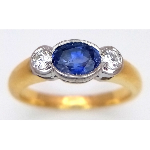 15 - An 18K YELLOW GOLD DIAMOND AND SAPPHIRE RING 0.30CT DIAMONDS AND 0.50CT OVAL SAPPHIRE 5.3G SIZE N 1/... 