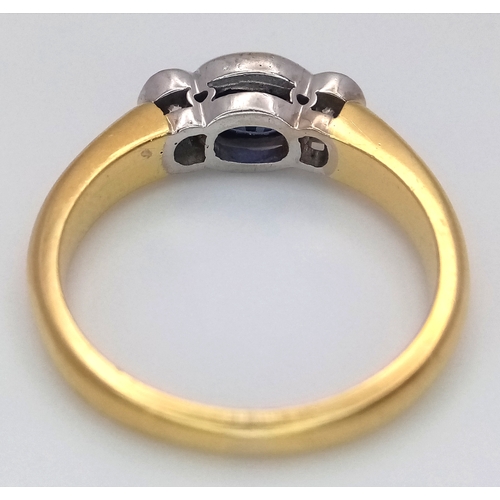 15 - An 18K YELLOW GOLD DIAMOND AND SAPPHIRE RING 0.30CT DIAMONDS AND 0.50CT OVAL SAPPHIRE 5.3G SIZE N 1/... 