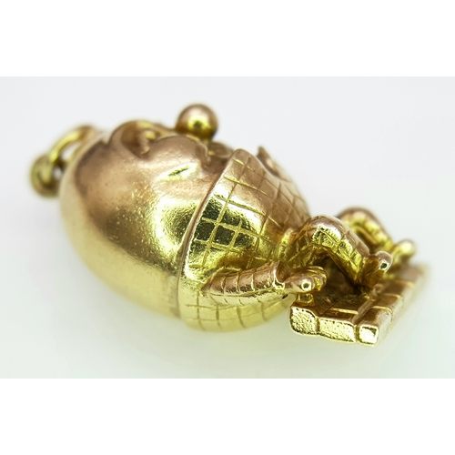 162 - A 9K YELLOW GOLD HUMPTY DUMPTY SITTING ON A WALL CHARM / PENDANT 6.3G. Ref: TAN 7010