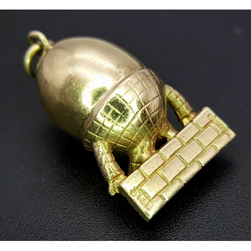 162 - A 9K YELLOW GOLD HUMPTY DUMPTY SITTING ON A WALL CHARM / PENDANT 6.3G. Ref: TAN 7010