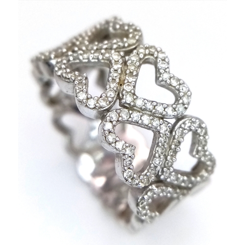 372 - A 9K WHITE GOLD TWO ROW DIAMOND SET HEARTS RING 4.8G SIZE P. Ref: TAN 7011