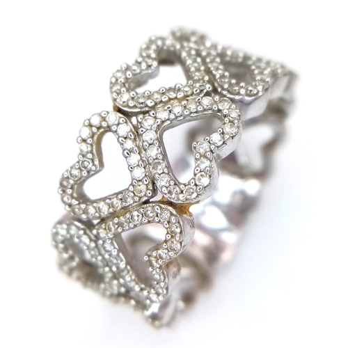 372 - A 9K WHITE GOLD TWO ROW DIAMOND SET HEARTS RING 4.8G SIZE P. Ref: TAN 7011
