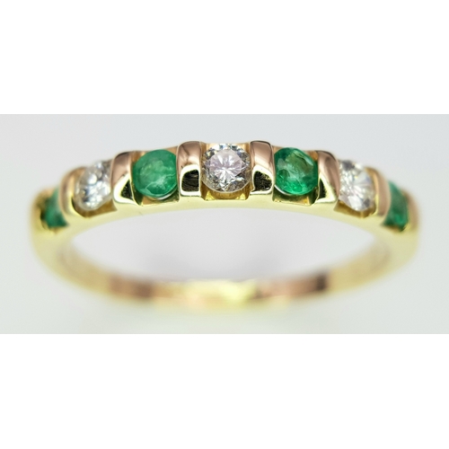 402 - A 14K Yellow Gold, Diamond and Emerald Ring. Size P. 2.22g.
MT33.