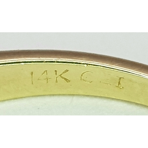 402 - A 14K Yellow Gold, Diamond and Emerald Ring. Size P. 2.22g.
MT33.