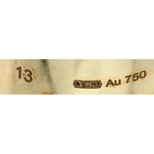 57 - An 18K YELLOW GOLD GUCCI GG RING 17.3G SIZE M. Ref: TAN 7023