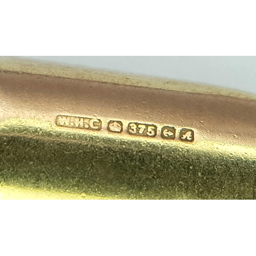 779 - A 9K YELLOW GOLD FORK AND TROWEL CHARM / PENDANT 1.6G. Ref: TAN 7004