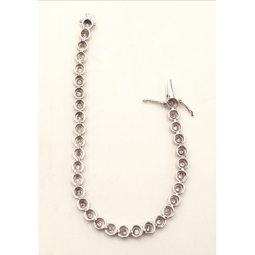 8 - An 18K WHITE GOLD DIAMOND SET TENNIS BRACELET, APPROX 2CT DIAMONDS 14.6G. Ref: SPSA 7001