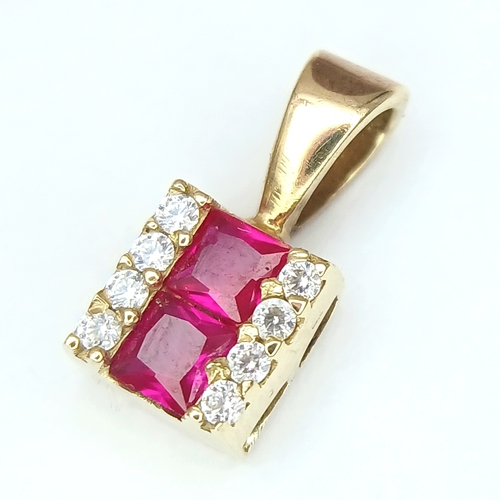 946 - A 9K YELLOW GOLD STONE SET PENDANT 0.5G. Ref: TAN 7009