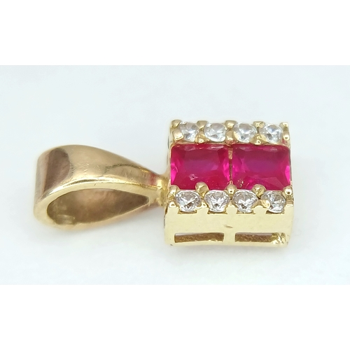 946 - A 9K YELLOW GOLD STONE SET PENDANT 0.5G. Ref: TAN 7009